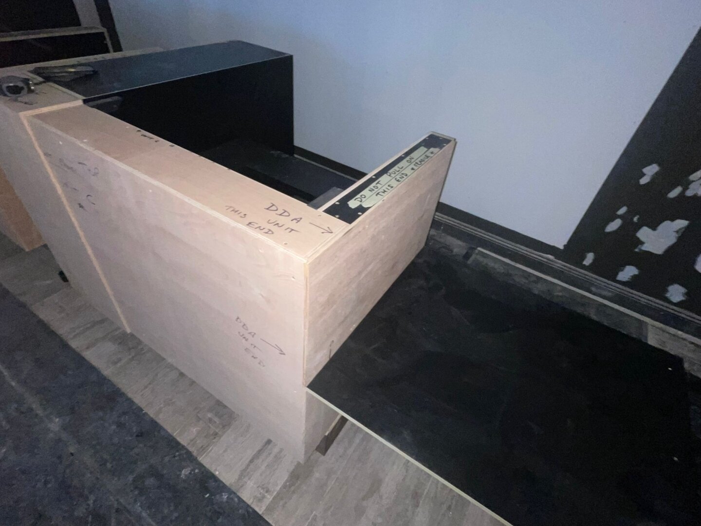 Shaw Stone team installing the reception desk surfaces at voco Southampton during the refurbishment