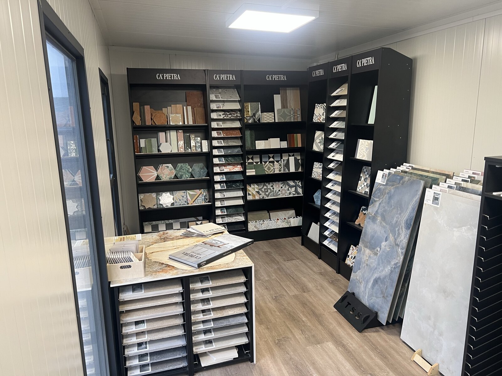 Ca'Pietra premium tile display within the Shaw Stone showroom
