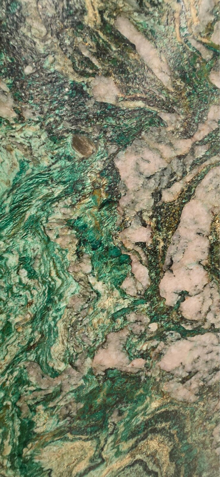 Close-up detail of Pandora Green showing green fuchsite, gold veins and white quartz